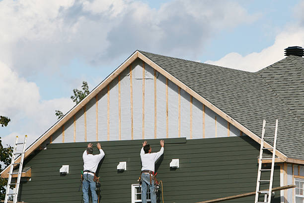 Professional Siding Installation technician working in West Babylon, NY